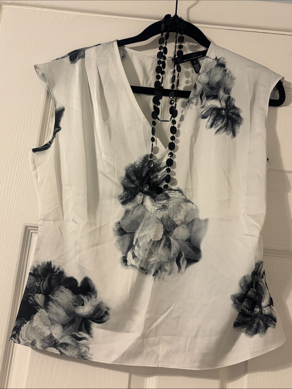 White House Black Market White Sleeveless V-Neck Top with Black Floral Print